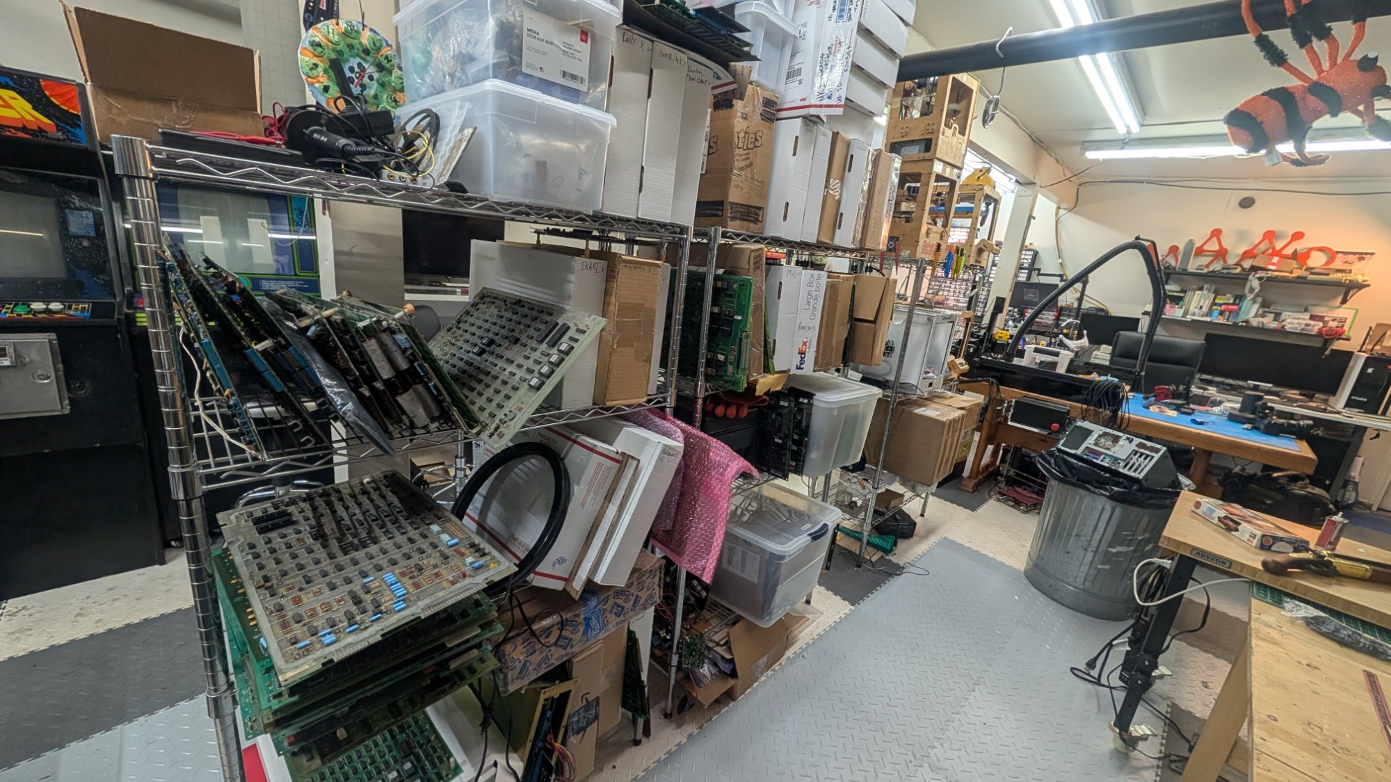 Large inventory of vintage arcade PCB boards including JAMMA and classic discrete boards