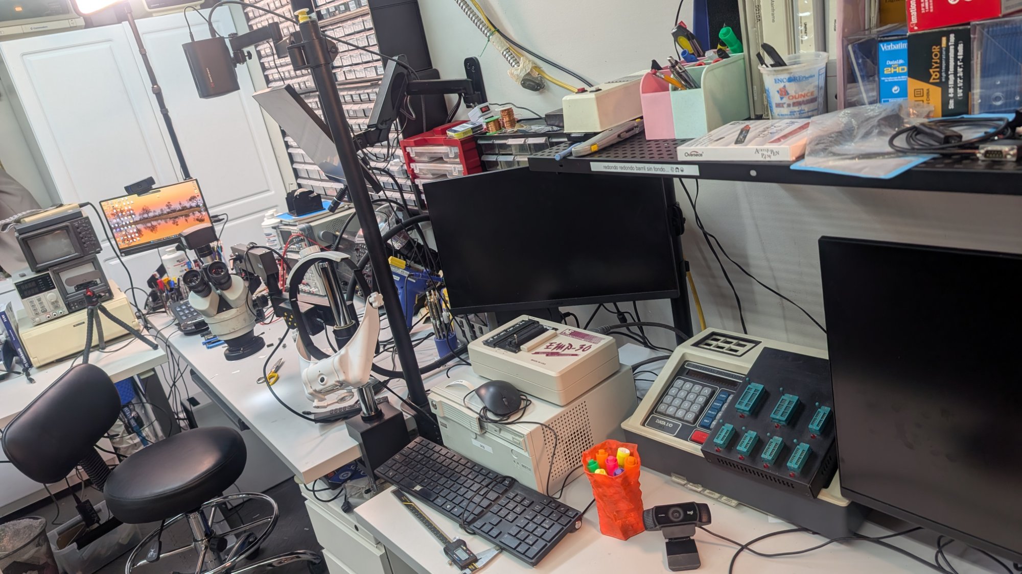 Professional electronics diagnostic workbench with oscilloscope, EPROM programmer, stereo microscope for arcade board repair